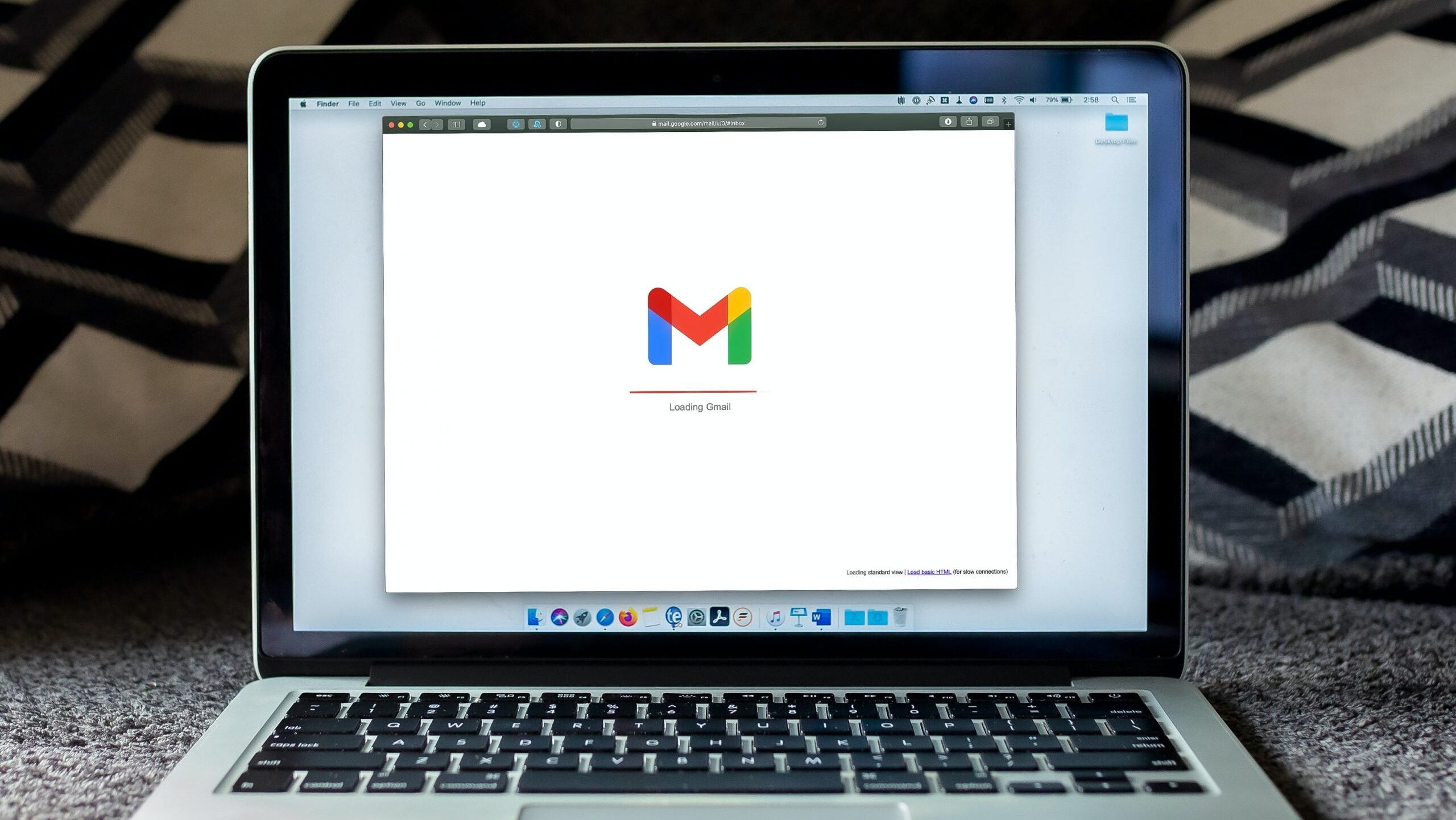 Gmail loading on a laptop.