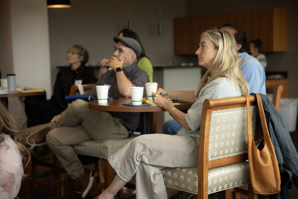 Group of marketers meeting and learning from others.